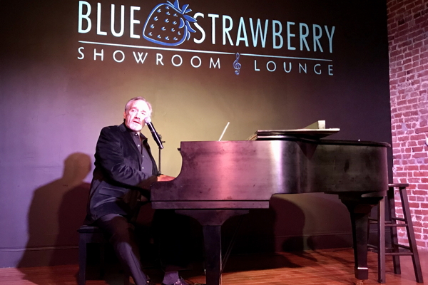 Rick Jensen at the Blue Strawberry. Photo by Chuck Lavazzi.