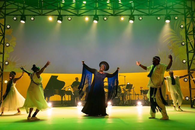 Somi Kakoma, as Miriam Makeba, is joined by the ensemble and musicians in The Rep St Louis world premier of 'Dreaming Zenzile,' photo by T Charles Erickson.