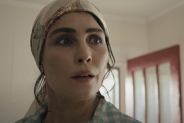 'The Secrets We Keep' More Than Merely A Thriller A woman wearing a headscarf looks alarmed.
