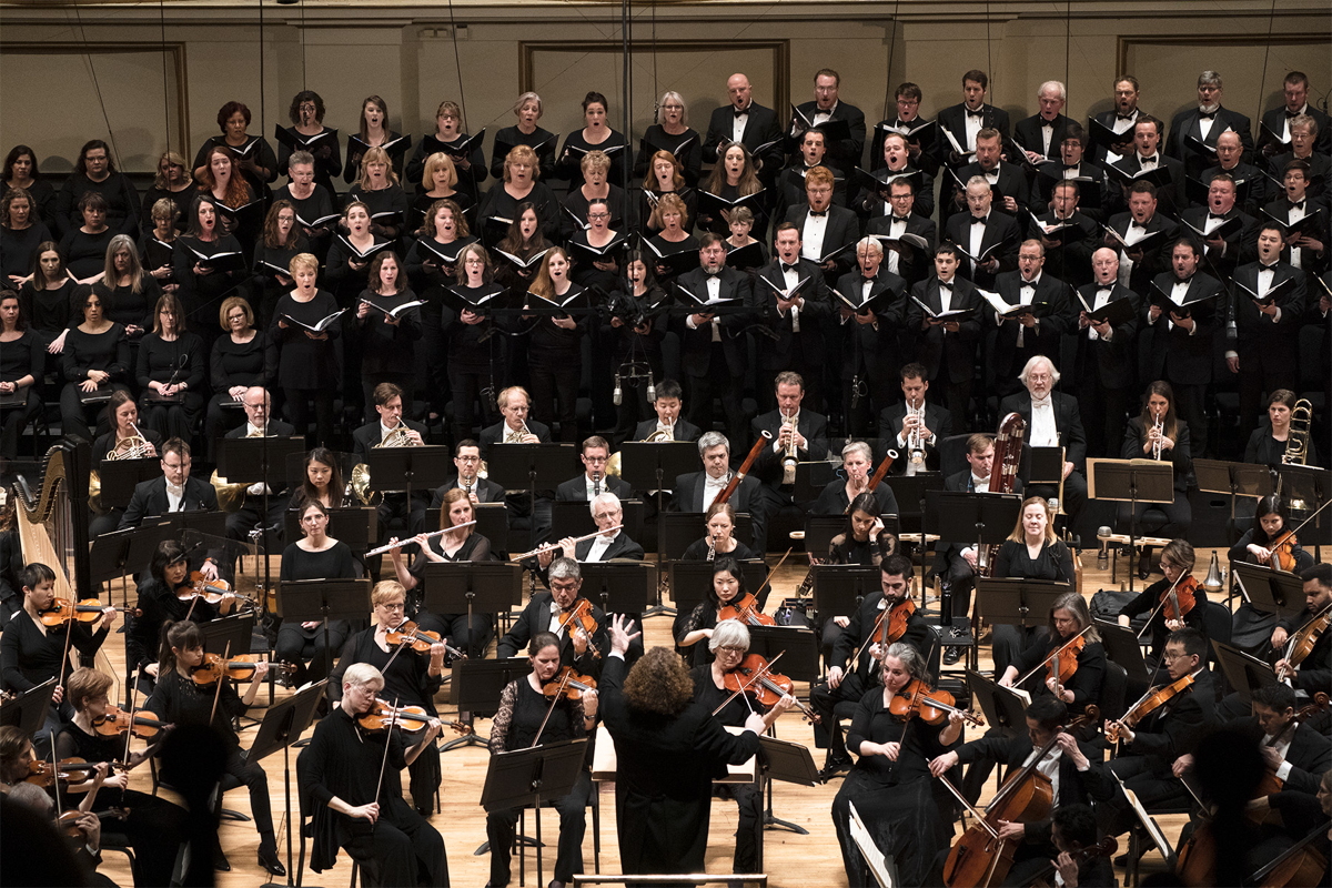 Stéphane Denève conducts the St. Louis Symphony Orchestra and Chorus. Photo by Dilip Vishnwat, courtesy of the SLSO.