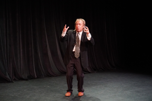 Joe Hanrahan in a scene from The Midnight Company production of 'Here Lies Henry,' a one-act, one actor show by Daniel MacIvor; photo by Joey Rumpell.