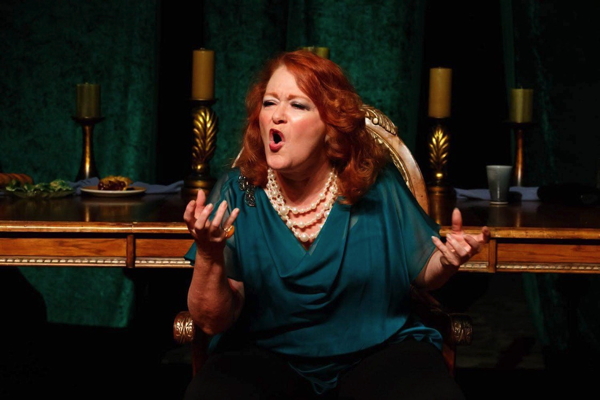 Donna Parrone is a scene from Tesseract Theatre’s production of ‘Feast’ by Megan Gogerty, photo by Jeff Hirsch